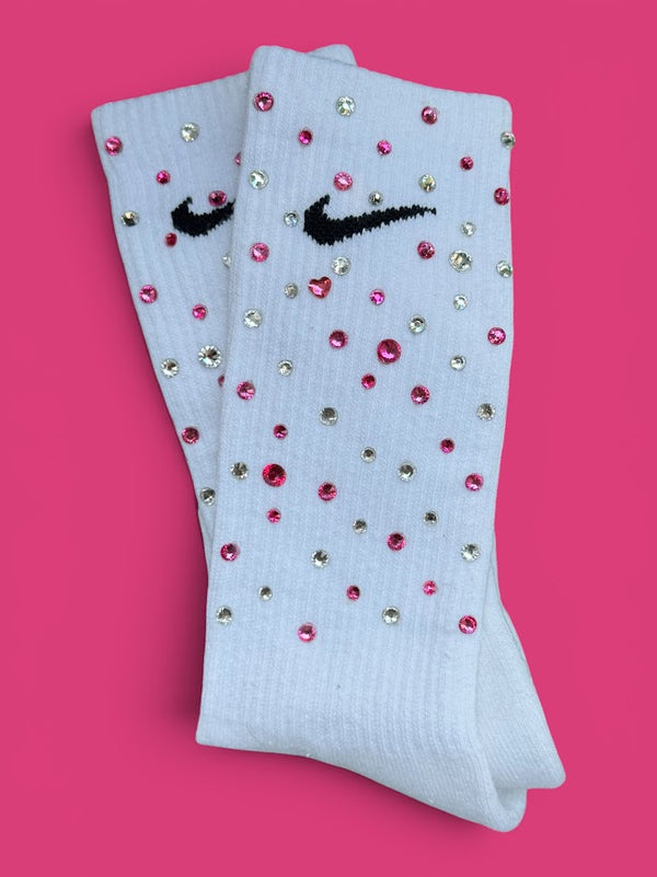 Ruby Blushing in October rhinestone Nike socks with hot pink, ruby red and crystal clear rhinestones on a pink background